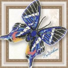 фото: Бабочка Rhetus Dysonii, вышитая бисером на прозрачной основе