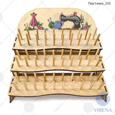 фото: деревянная подставка для катушек, украшенная вышивкой бисером или нитками